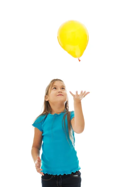 Flicka med gul ballong — Stockfoto