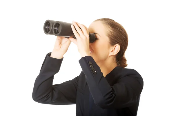 Businessman Looking into a binocular — Stock Photo, Image