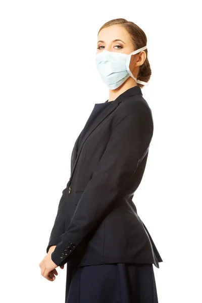 Podnikatelka v ochranné masce — Stock fotografie