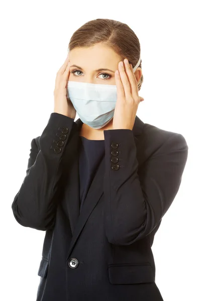 Businesswoman in protective mask — Stock Photo, Image