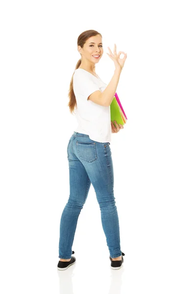 Woman holding notebooks — Stock Photo, Image