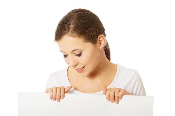 Woman holding white banner — Stock Photo, Image