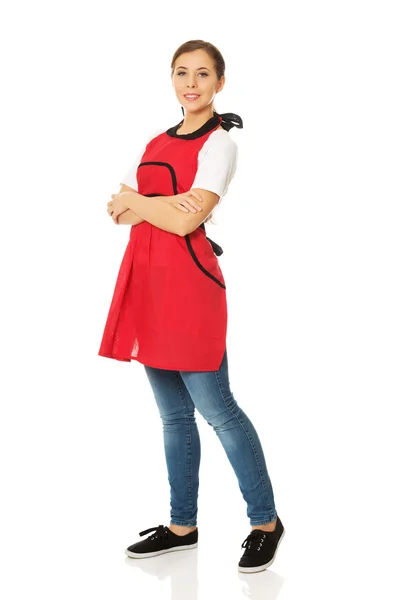 Woman wearing red apron — Stock Photo, Image