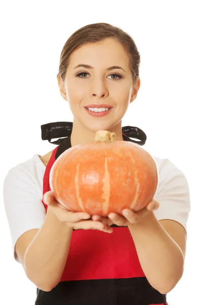 Woman holding a pumpkin — Stock Photo, Image