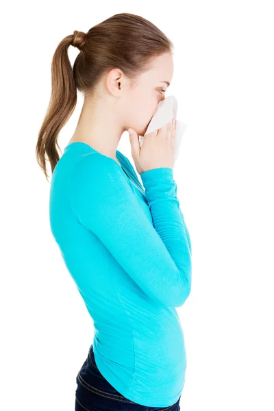 Blonde woman sneezing — Stock Photo, Image