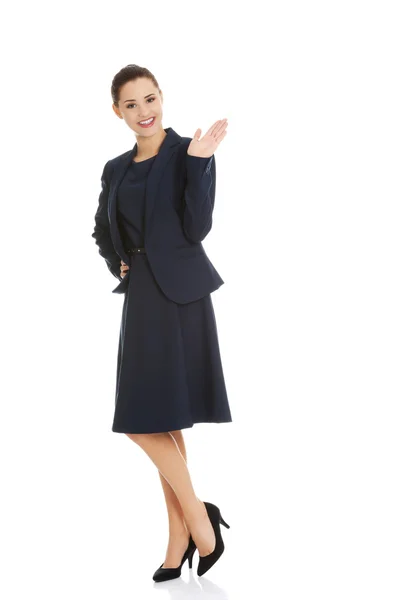 Business woman waving her hand — Stock Photo, Image