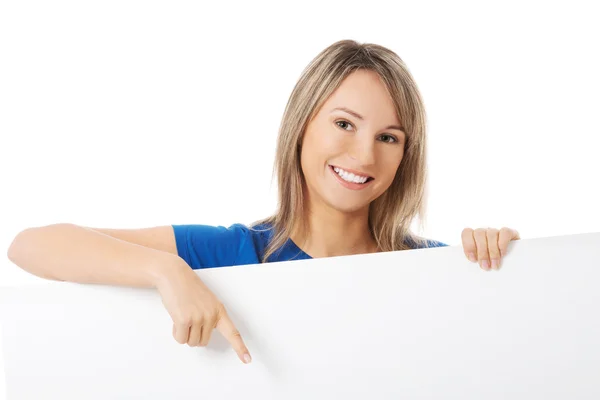 Woman holding white banner Royalty Free Stock Photos