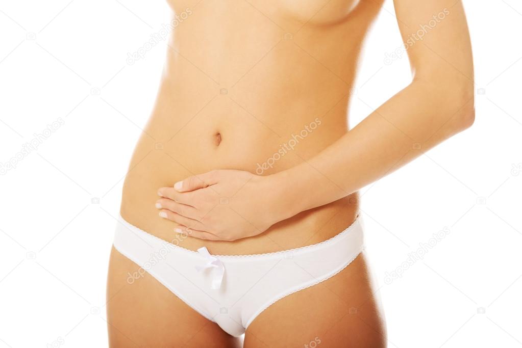 Woman massaging her belly
