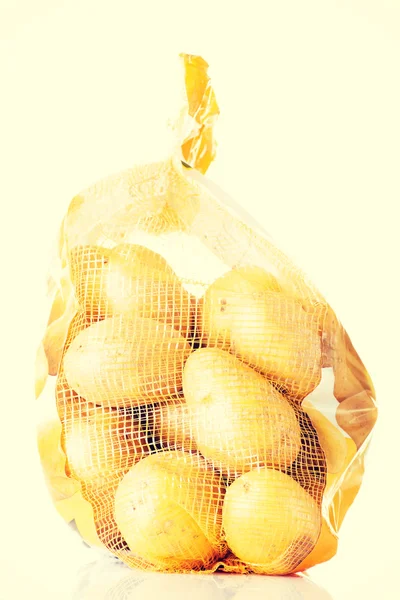 Fresh potatoes in a sack. — Stock Photo, Image