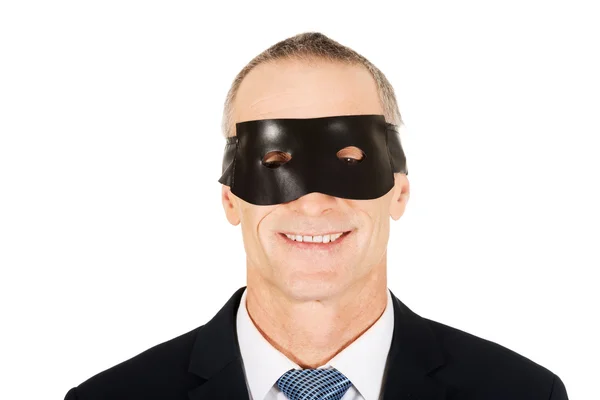 Affärsman i black eye mask — Stockfoto