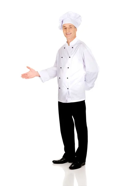 Szczęśliwy szef kuchni z przywitalny gest — Zdjęcie stockowe