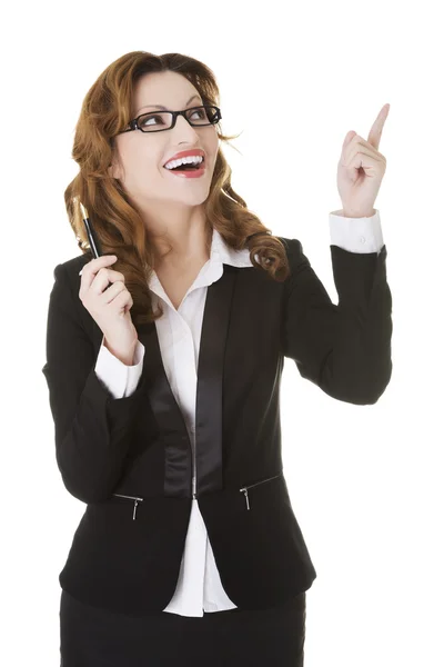 Businesswoman pointing up. — Stock Photo, Image