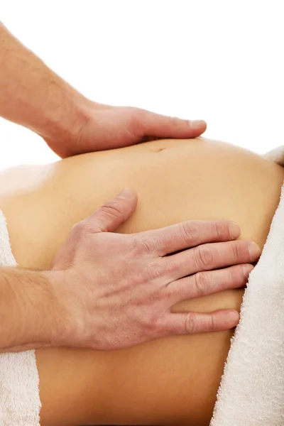 Mulher grávida fazendo uma massagem — Fotografia de Stock