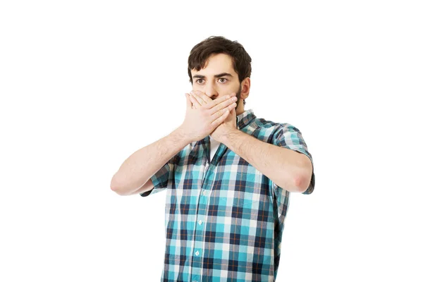 Hombre sorprendido cubriéndose la boca . —  Fotos de Stock