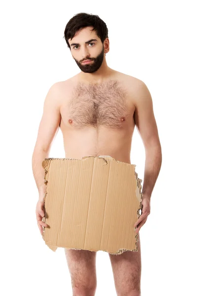 Man with a piece of cardboard. — Stock Photo, Image
