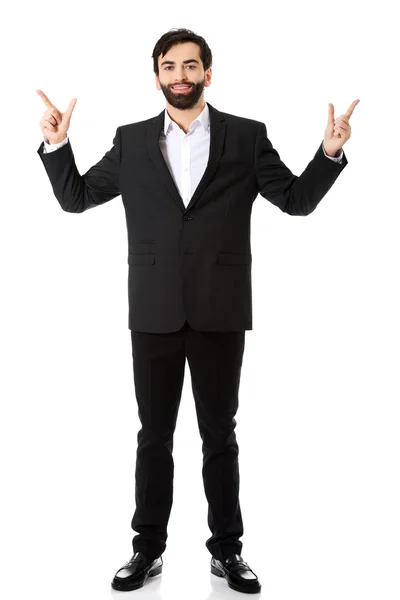 Businessman showing the size with two fingers. — Stock Photo, Image