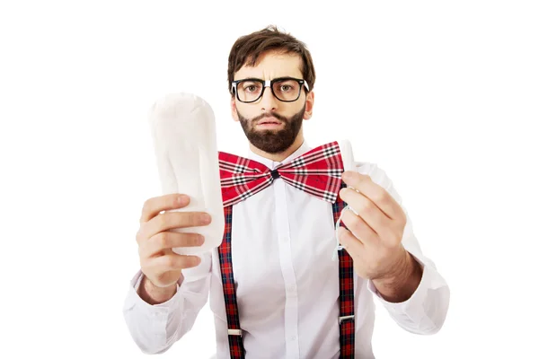 Man holding menstruation pad. — Stock Photo, Image