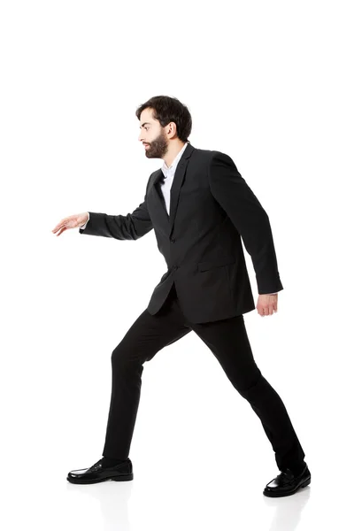 Businessman walking carefully. — Stock Photo, Image