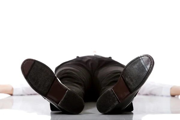 Businessman lying on the floor. — Stock Photo, Image