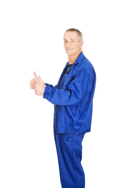 Repairman showing thumbs up sign — Stock Photo, Image