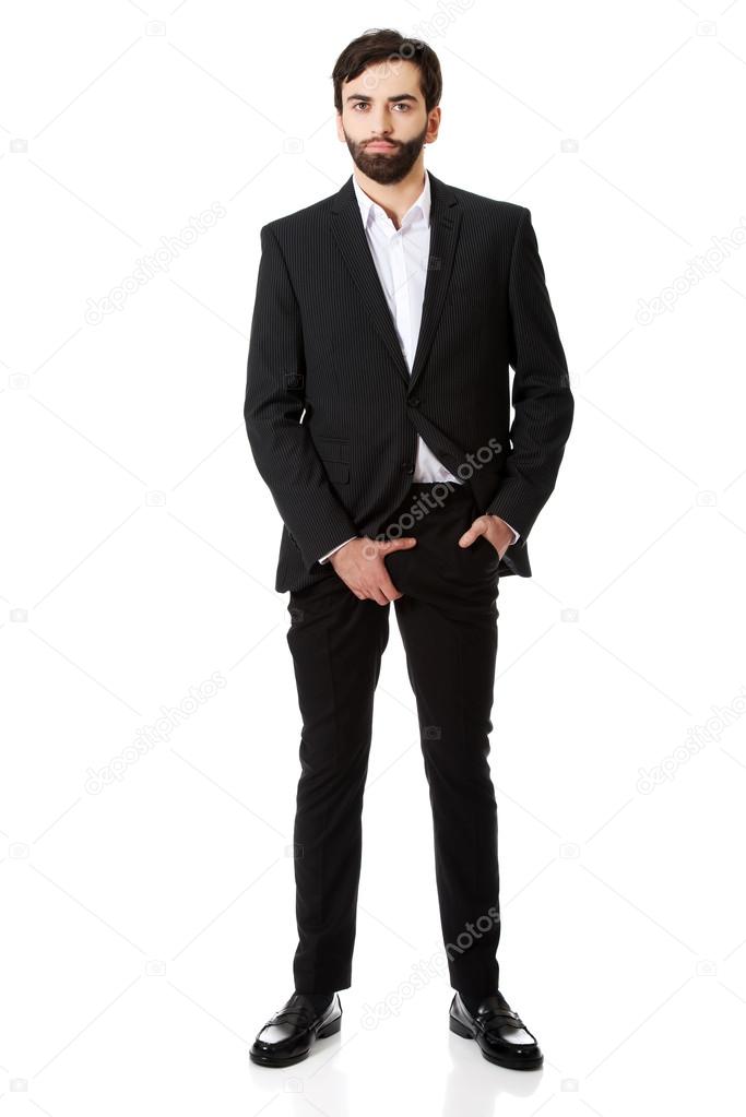 Businessman feeling pain in his crotch.