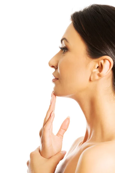 Thoughtful woman touching chin — Stock Photo, Image