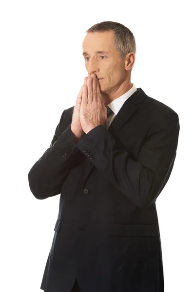 Businessman with clenched hands — Stock Photo, Image