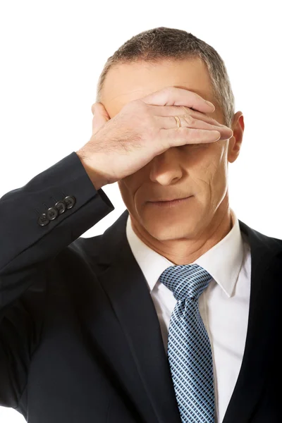 Businessman covering his face — Stock Photo, Image