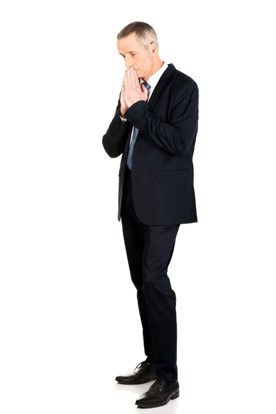 Businessman with clenched hands — Stock Photo, Image