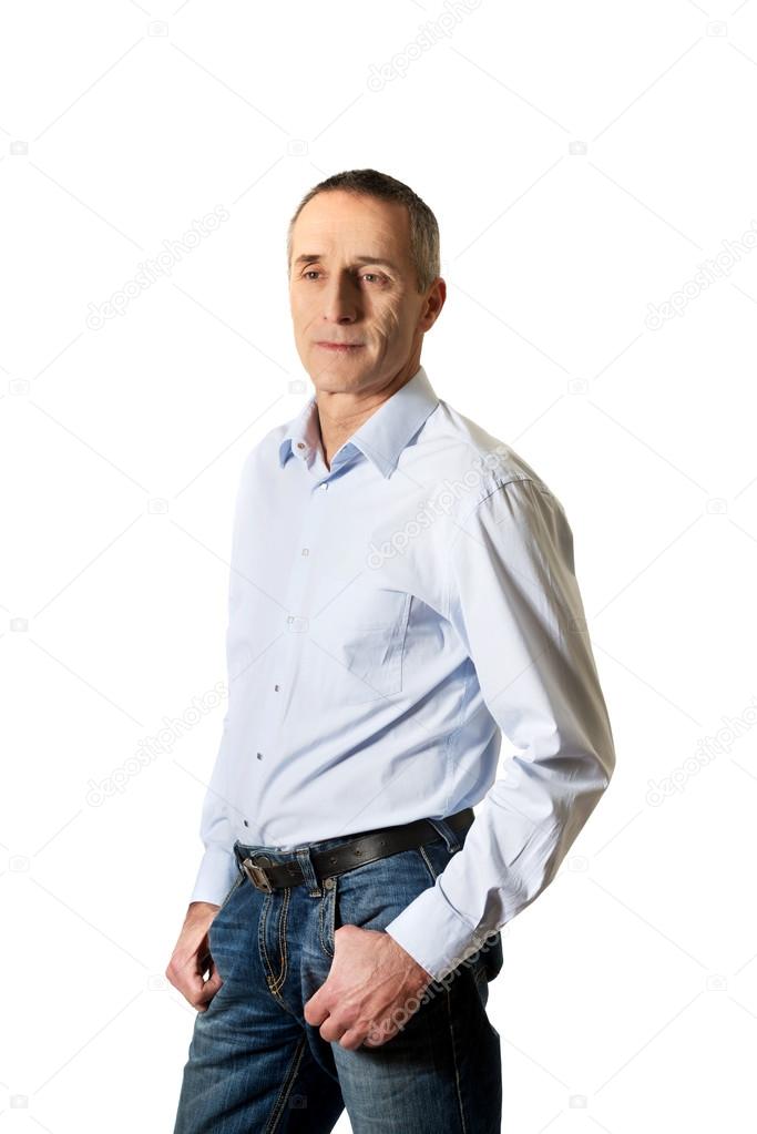 Handsome man with hands in pockets