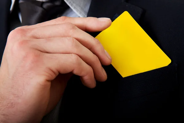 Empresario sacando su tarjeta personal del bolsillo . —  Fotos de Stock
