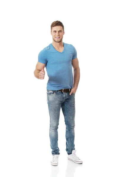 Happy man with thumbs up gesture. — Stock Photo, Image