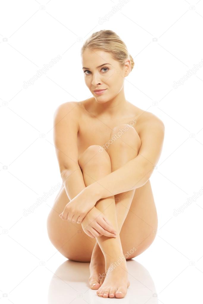 Naked woman sitting on floor Stock Photo by ©piotr_marcinski 66952673