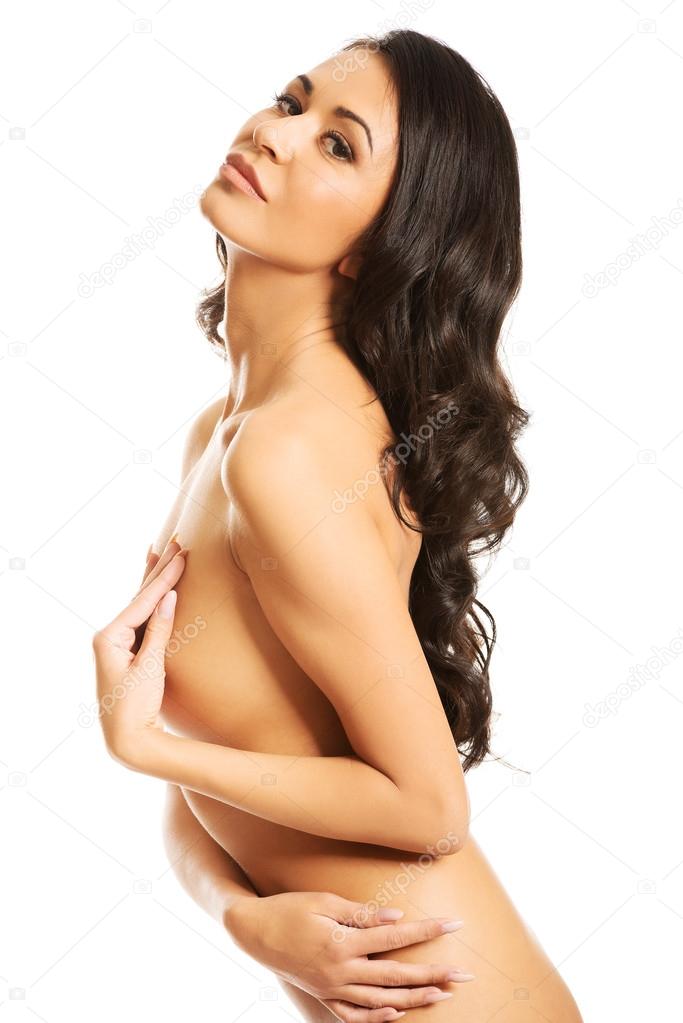 Young woman covering breast
