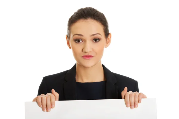 Businessswoman holding empty banner. — Stock Photo, Image