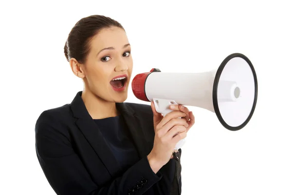 Empresária com um megafone . — Fotografia de Stock