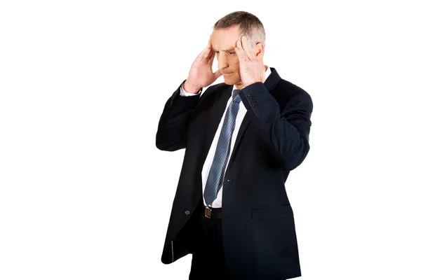 Businessman suffering from headache — Stock Photo, Image