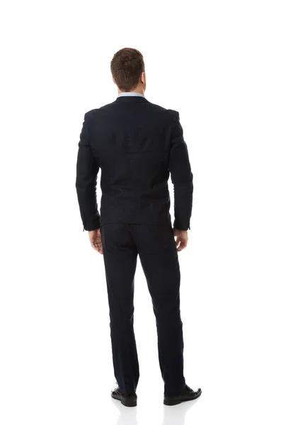 Businessman standing back to camera. — Stock Photo, Image