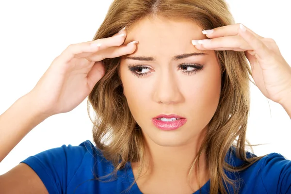 Mujer joven con dolor de cabeza . —  Fotos de Stock