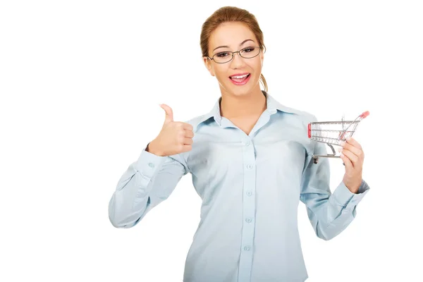 Businesswoman with shopping cart. — Stock Photo, Image