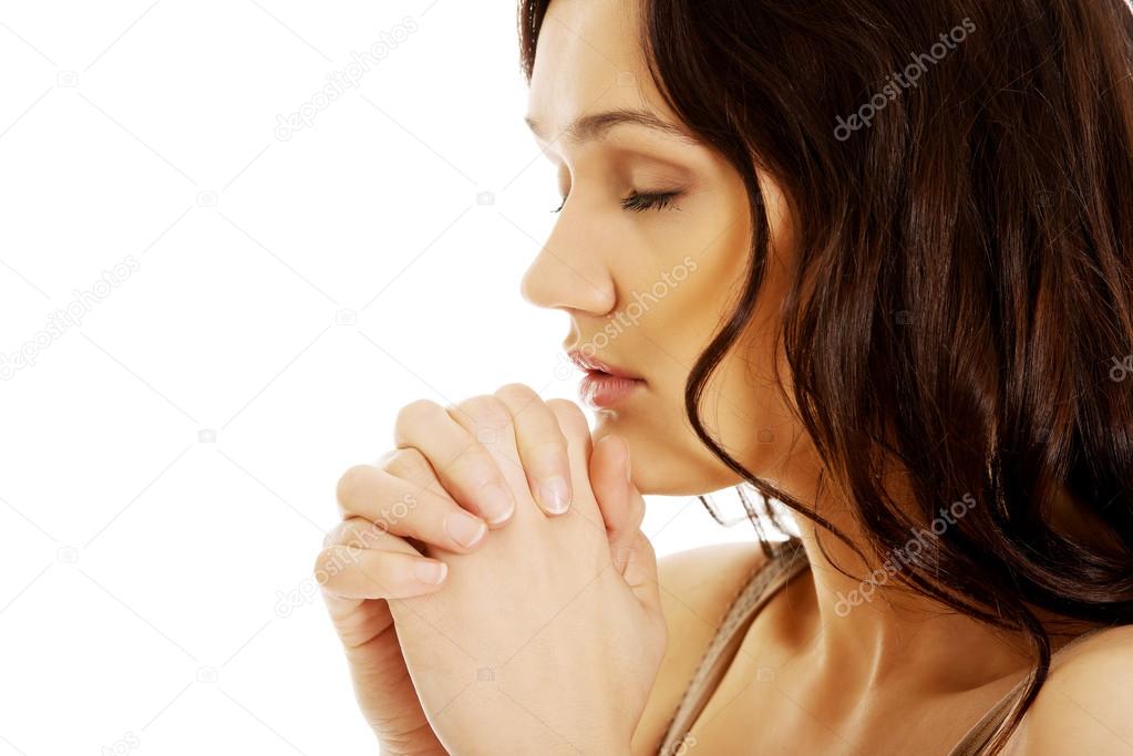 Woman praying with her hands