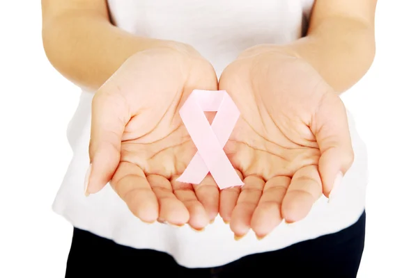 Woman showing pink ribbon. — Stock Photo, Image