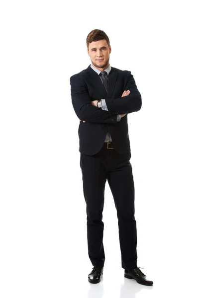 Successful businessman with folded arms. — Stock Photo, Image