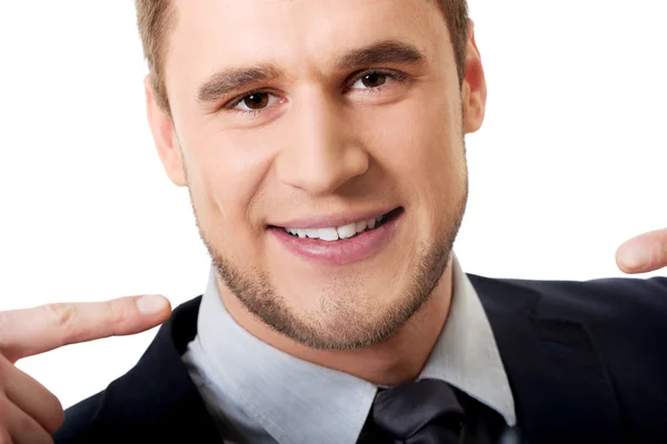 Happy businessman showing his white teeth. — Stock Photo, Image