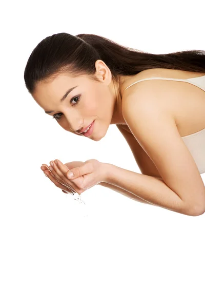 Woman washing her clean face. — Stock Photo, Image