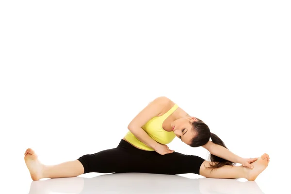 Fitness kvinna gör stretching motion. — Stockfoto
