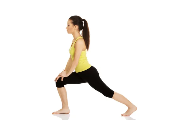 Fitness woman doing stretching exercise. — Stock Photo, Image