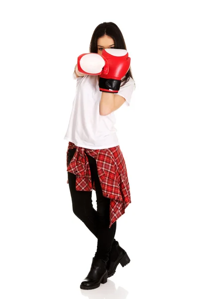 Young woman wearing boxing gloves. — Stock Photo, Image