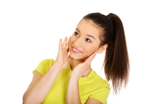 Mujer sonriente amistosa mirando hacia arriba . —  Fotos de Stock