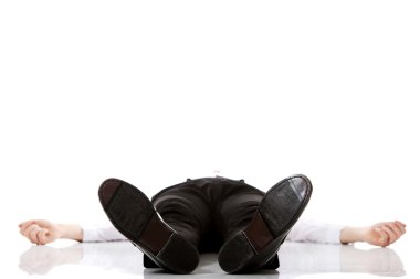 Exhausted businessman lying on the floor. clipart
